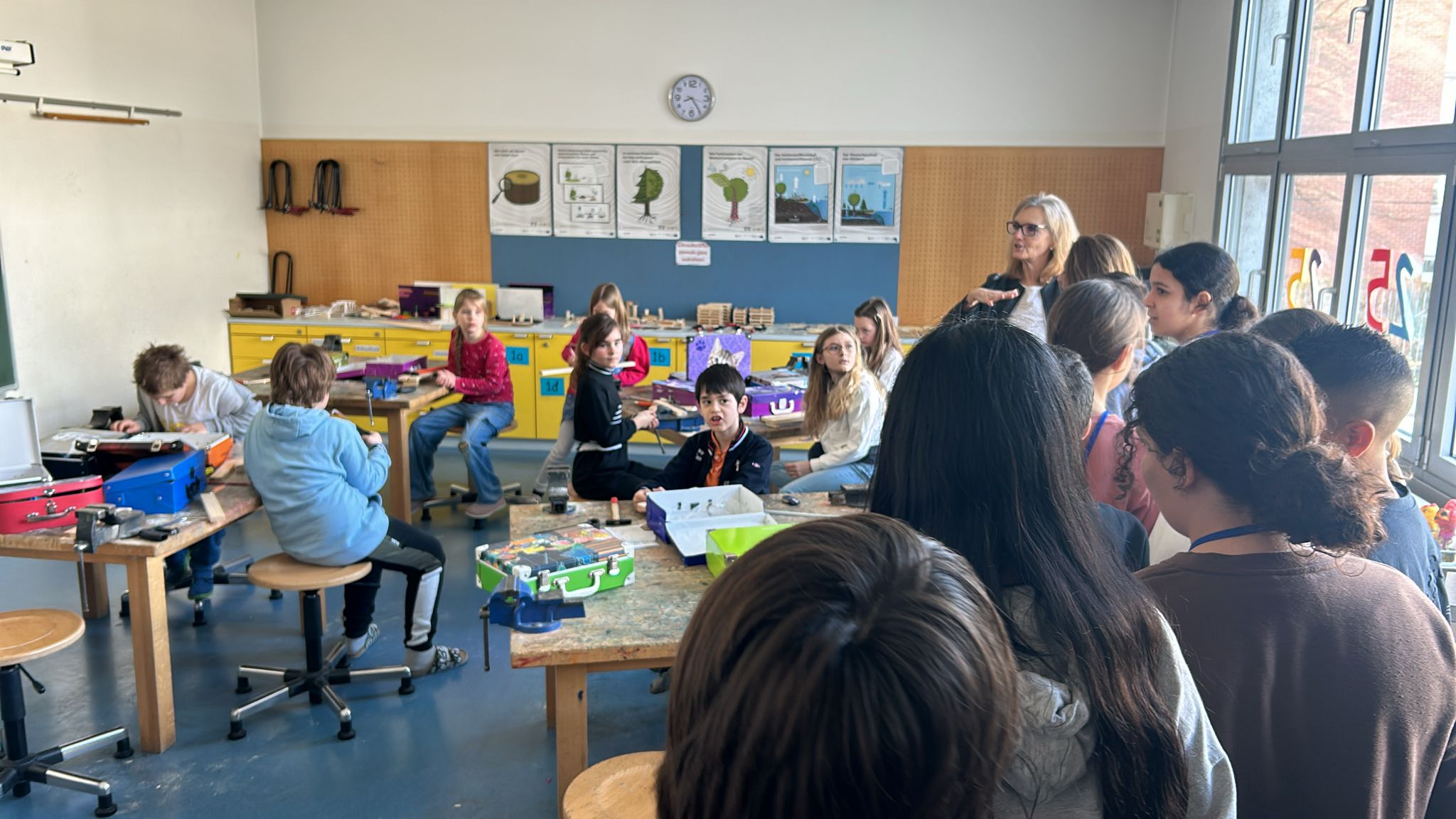 Students proudly displaying their certificates of completion